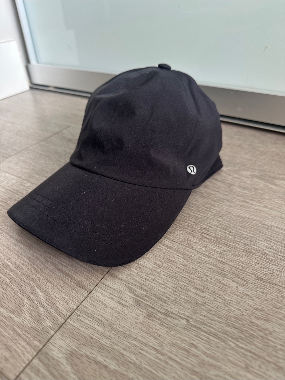 Lululemon Black Athletic running Cap with light reflecting rim. Preowned. OS